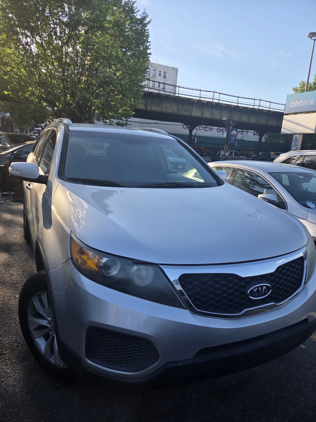 Silver Kia Sorento SUV - photo 3