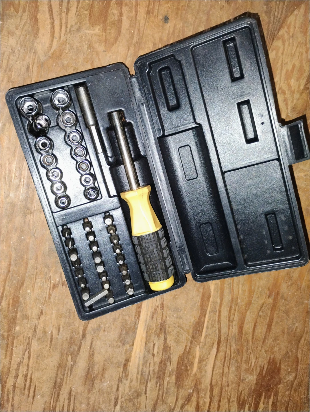 Set of small sockets and bits in case