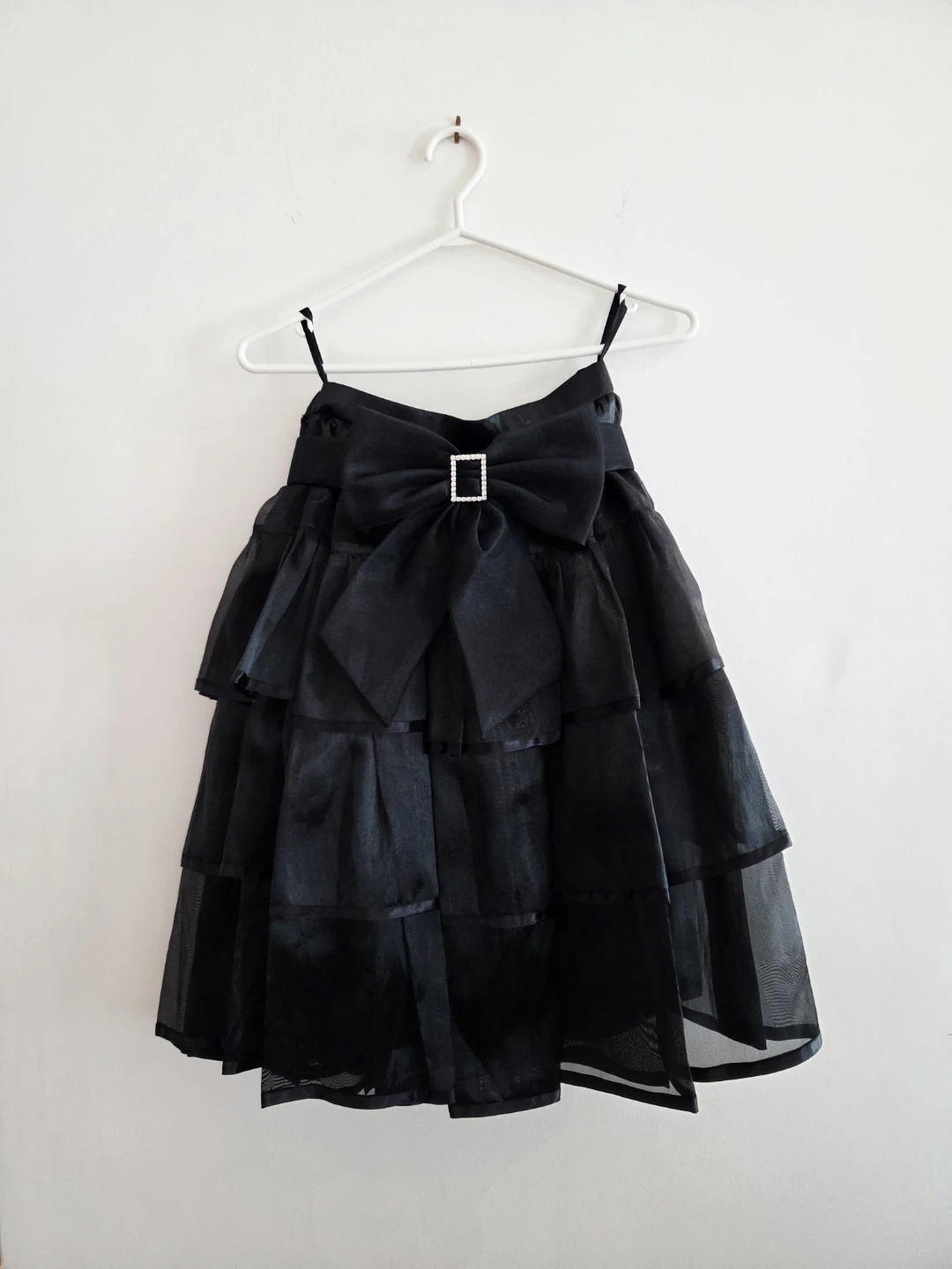 Black tiered party midi skirt with bow