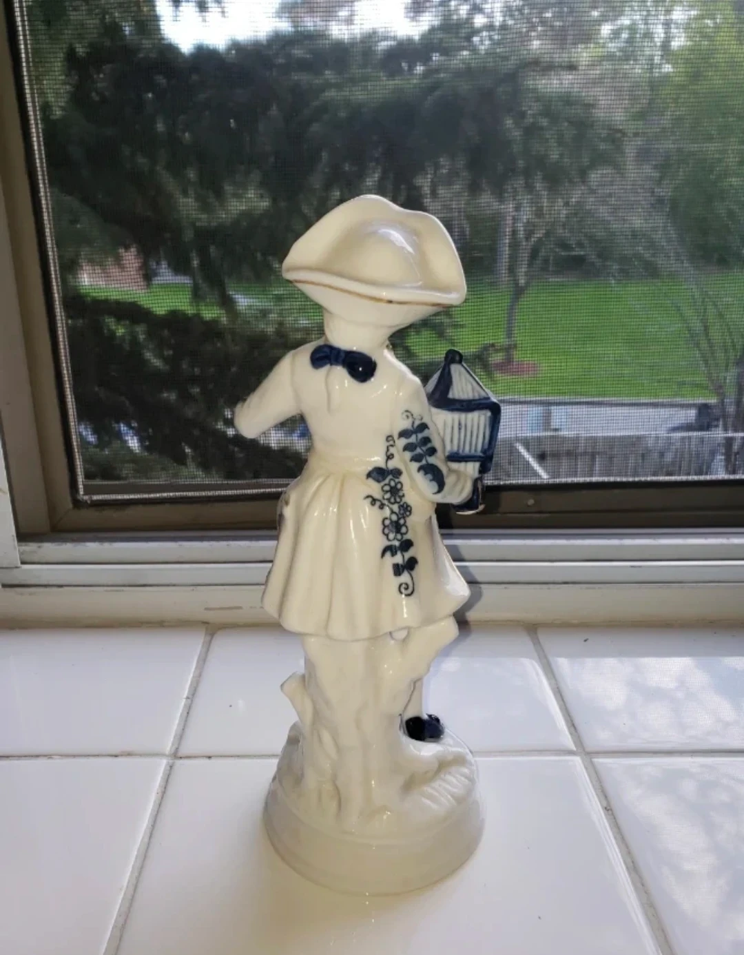 Porcelain Figurine Man with Bird Cage - photo 4