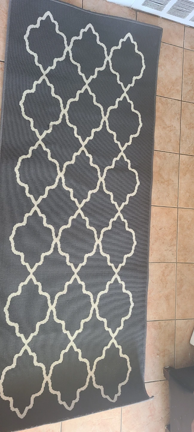 Grey and white geometric area rug