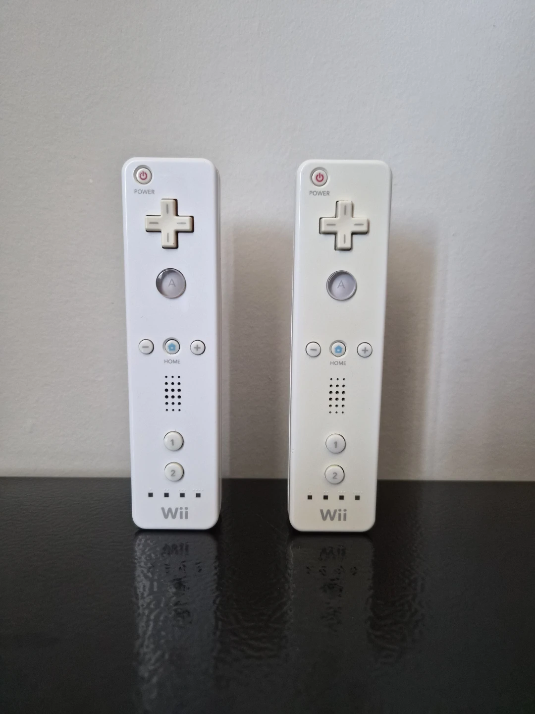 Read Bio | Pair Of Broken Wii Remotes