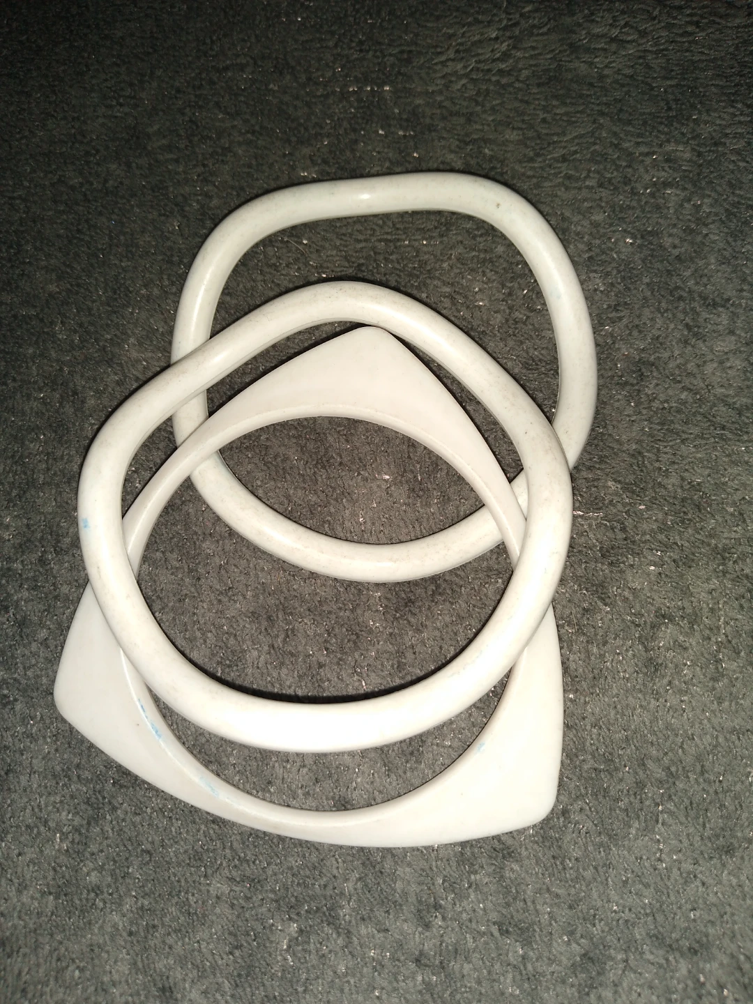Set of three vintage white bracelets