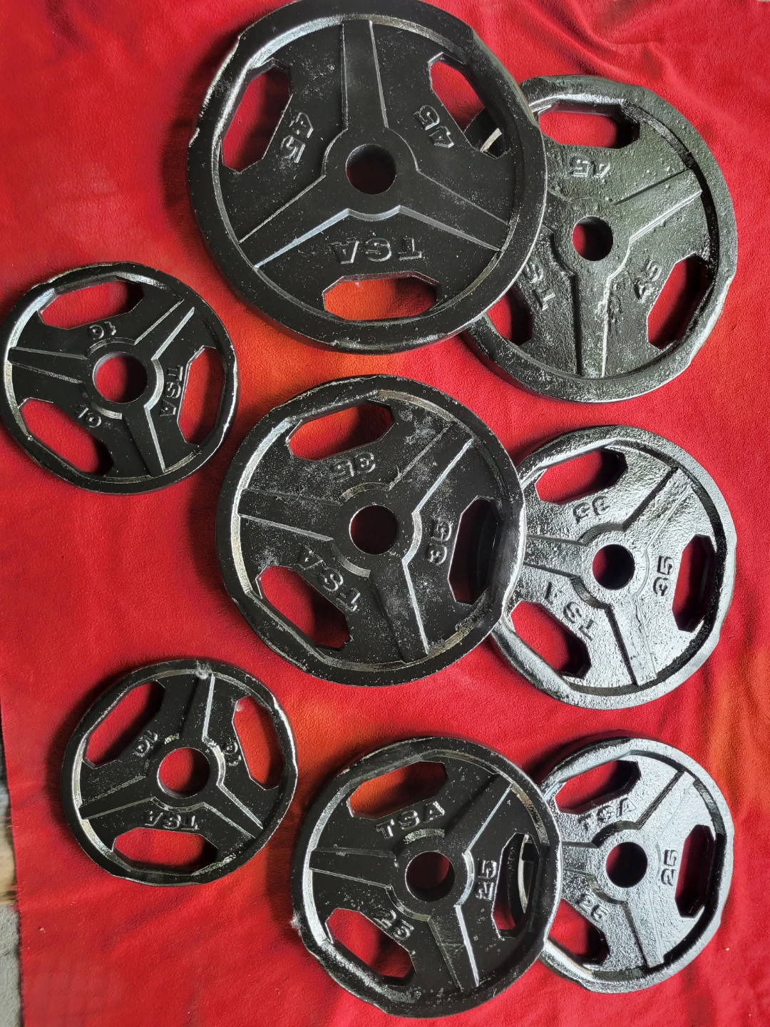 OLYMPIC 2" HOLE.  45s. 35s. 25s. 2-10s. PLATES 230LBs.