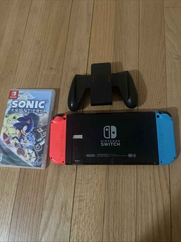 Nintendo Switch Console with Games and Accessories - photo 2