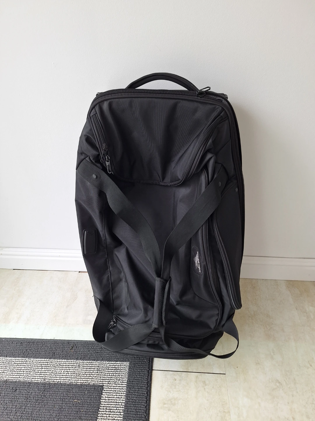 High Sierra Black Rolling Suitcase