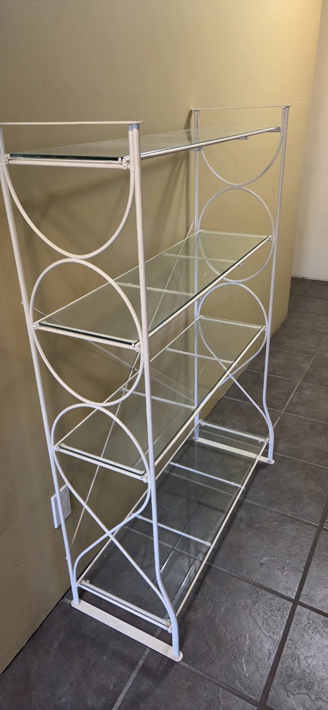 glass and white metal shelf