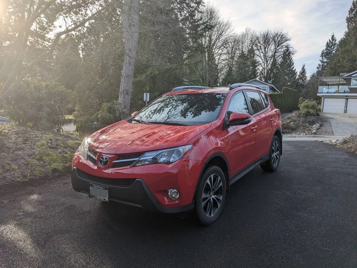 Red Toyota RAV4 XLE AWD