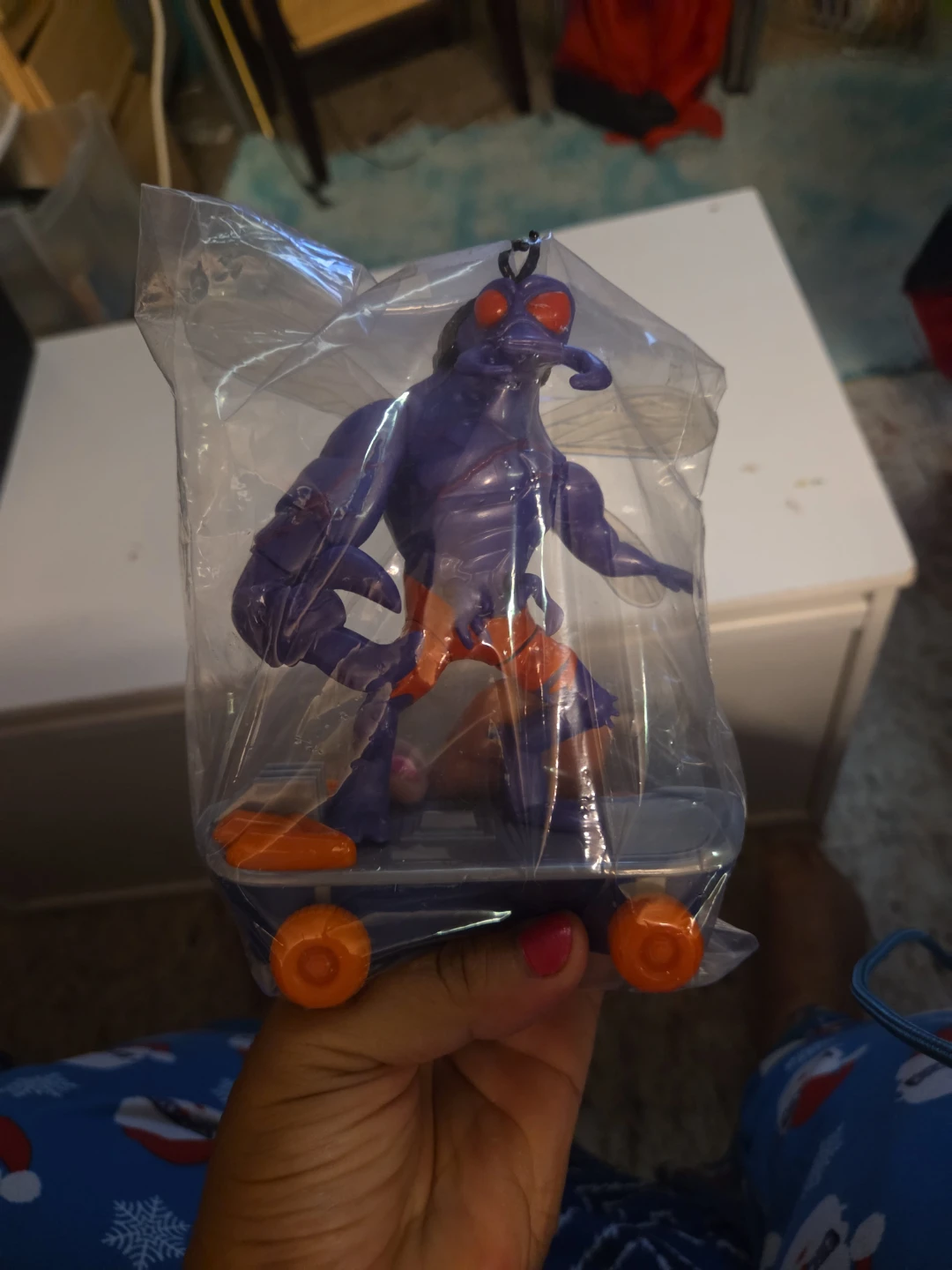 Purple Insect Skateboard Figure