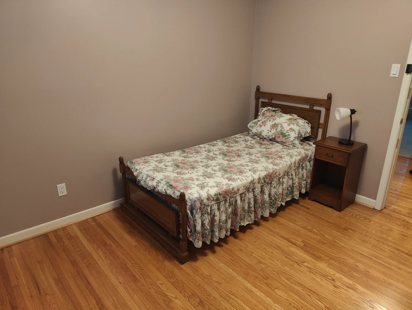 Wooden Twin Bed Frame with Floral Bedding