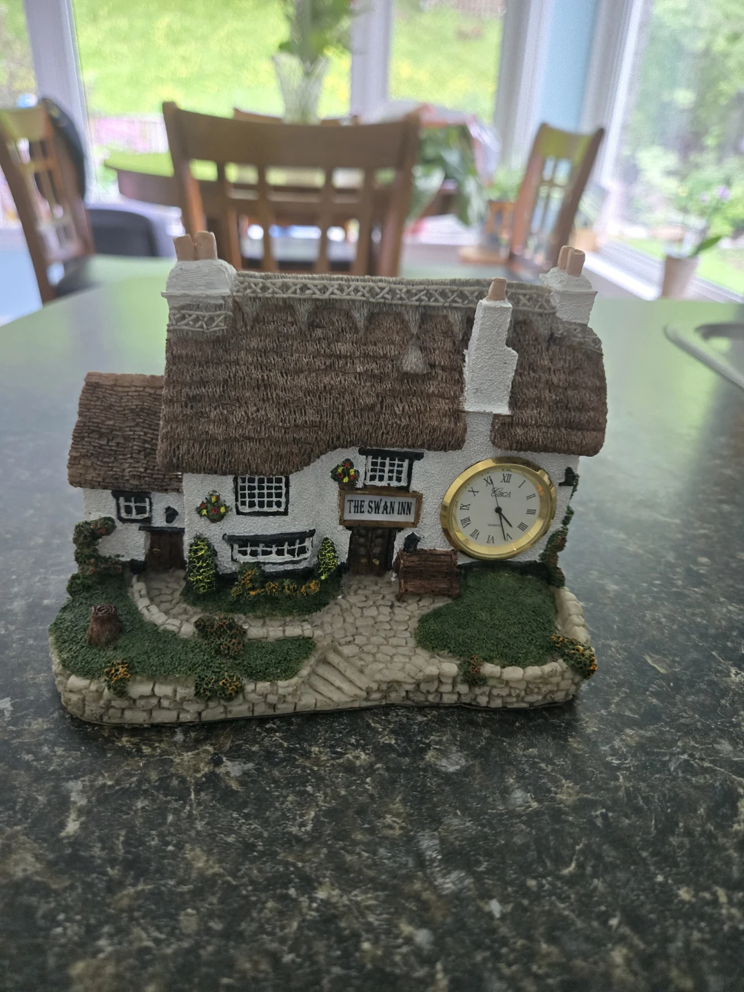 Figurine with clock