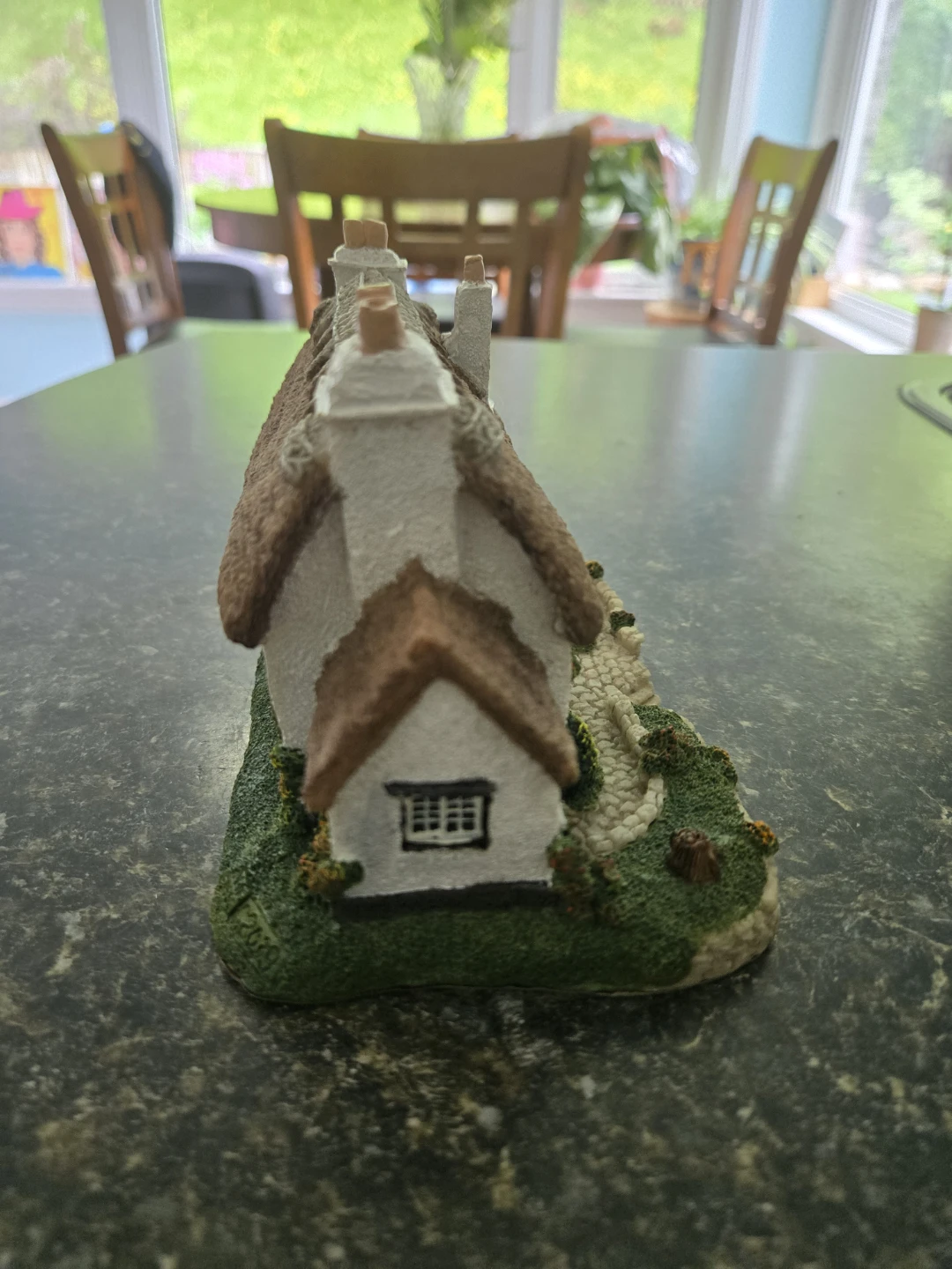 Figurine with clock - photo 3
