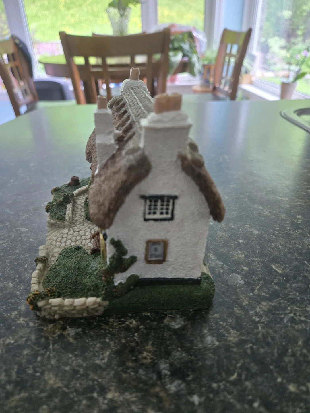 Figurine with clock - photo 4