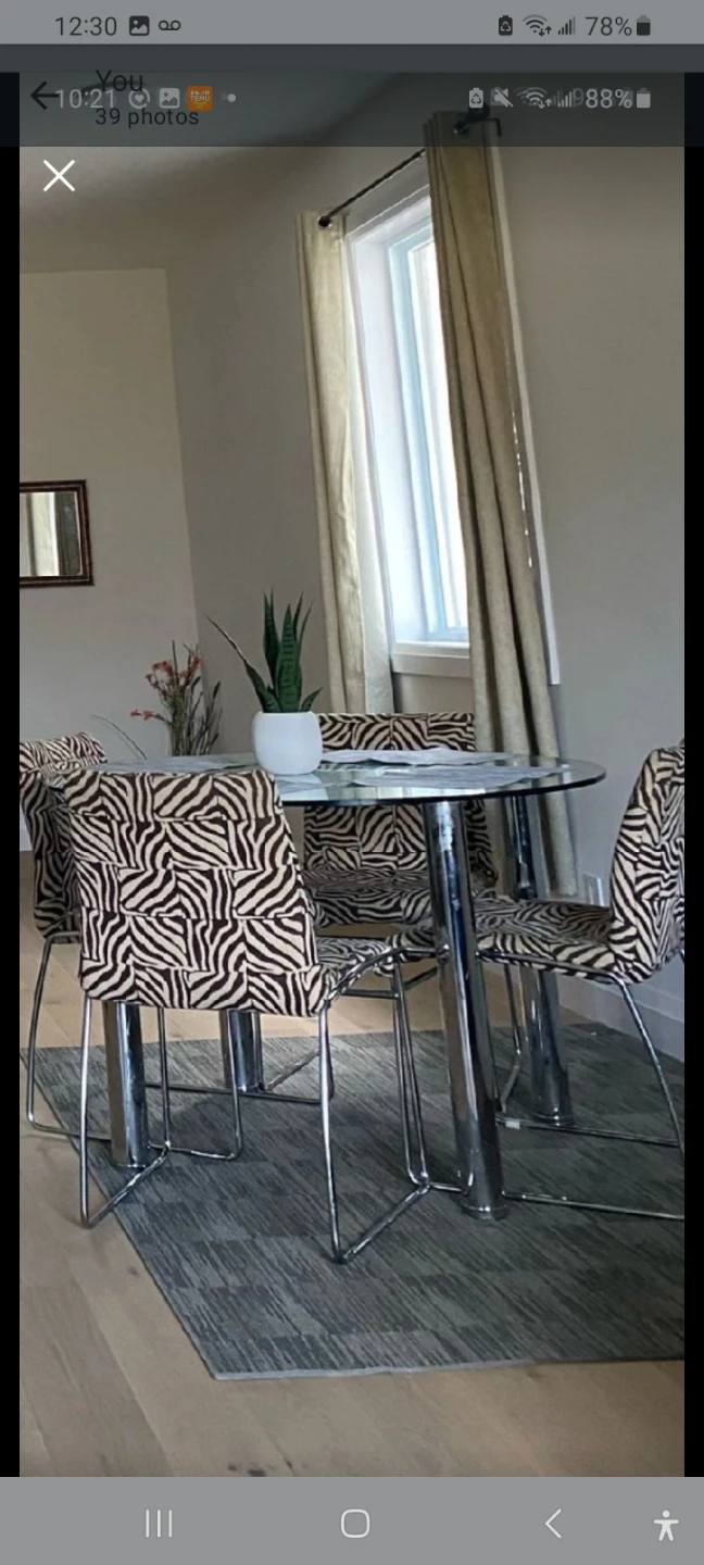 Glass Dining Table with 4 Zebra Print Chairs