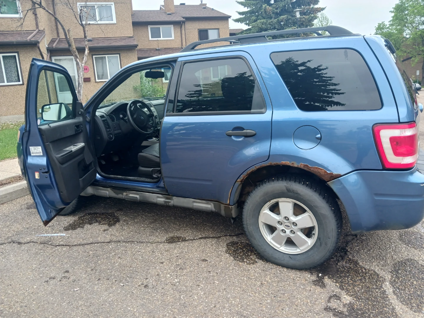 Blue Ford Escape SUV - photo 2