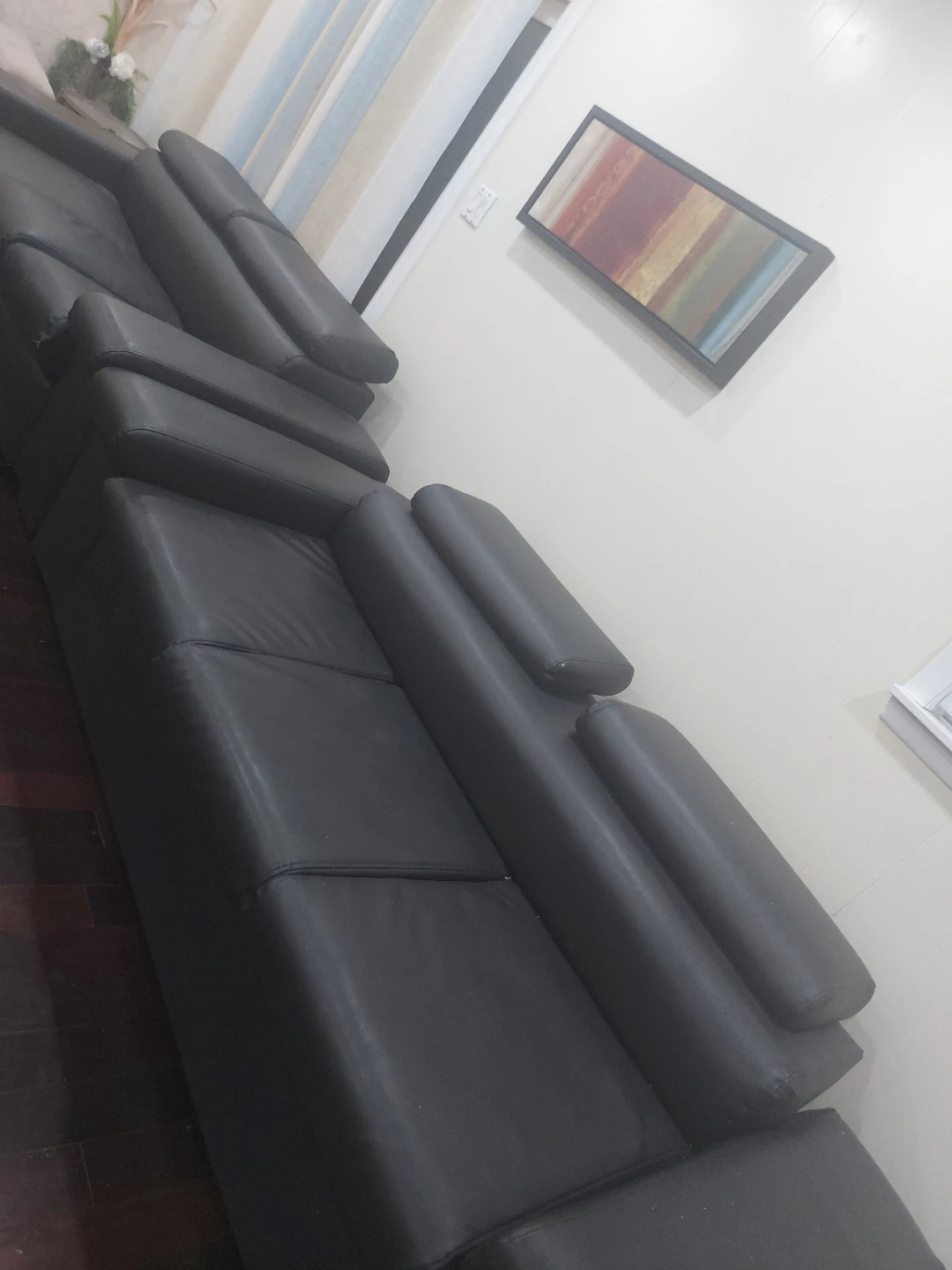 Black Leather Sectional Sofa with Storage