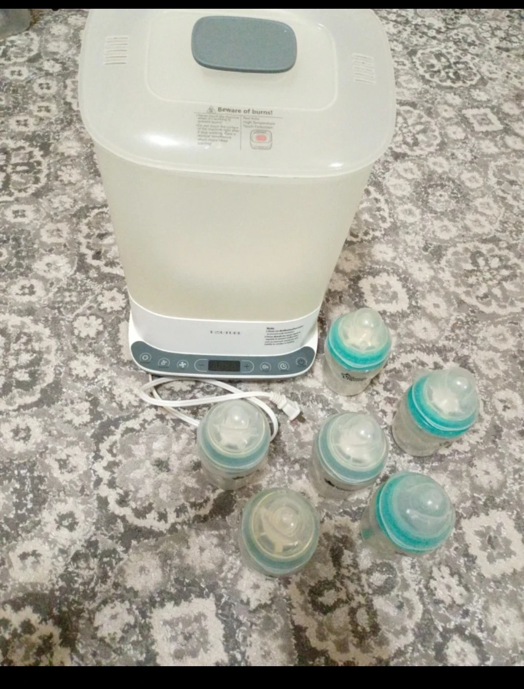 Tommee Tippee Electric Sterilizer and 7 Baby Bottles