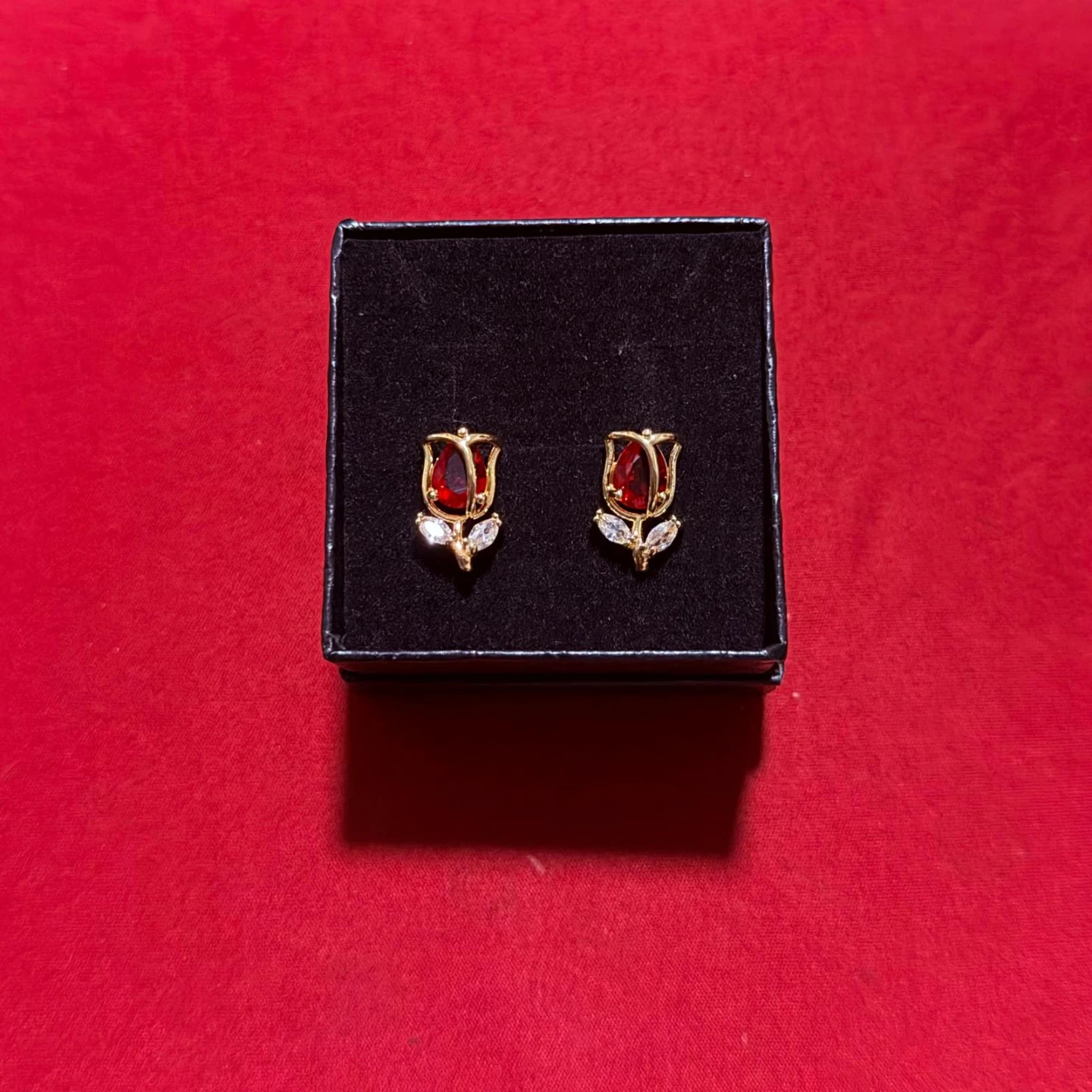 Beautiful earrings in the form of tulips