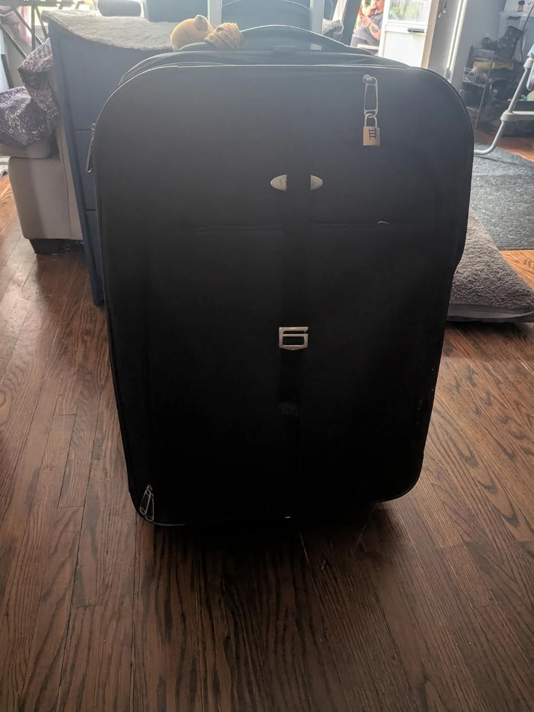 Samsonite Black Rolling Suitcase