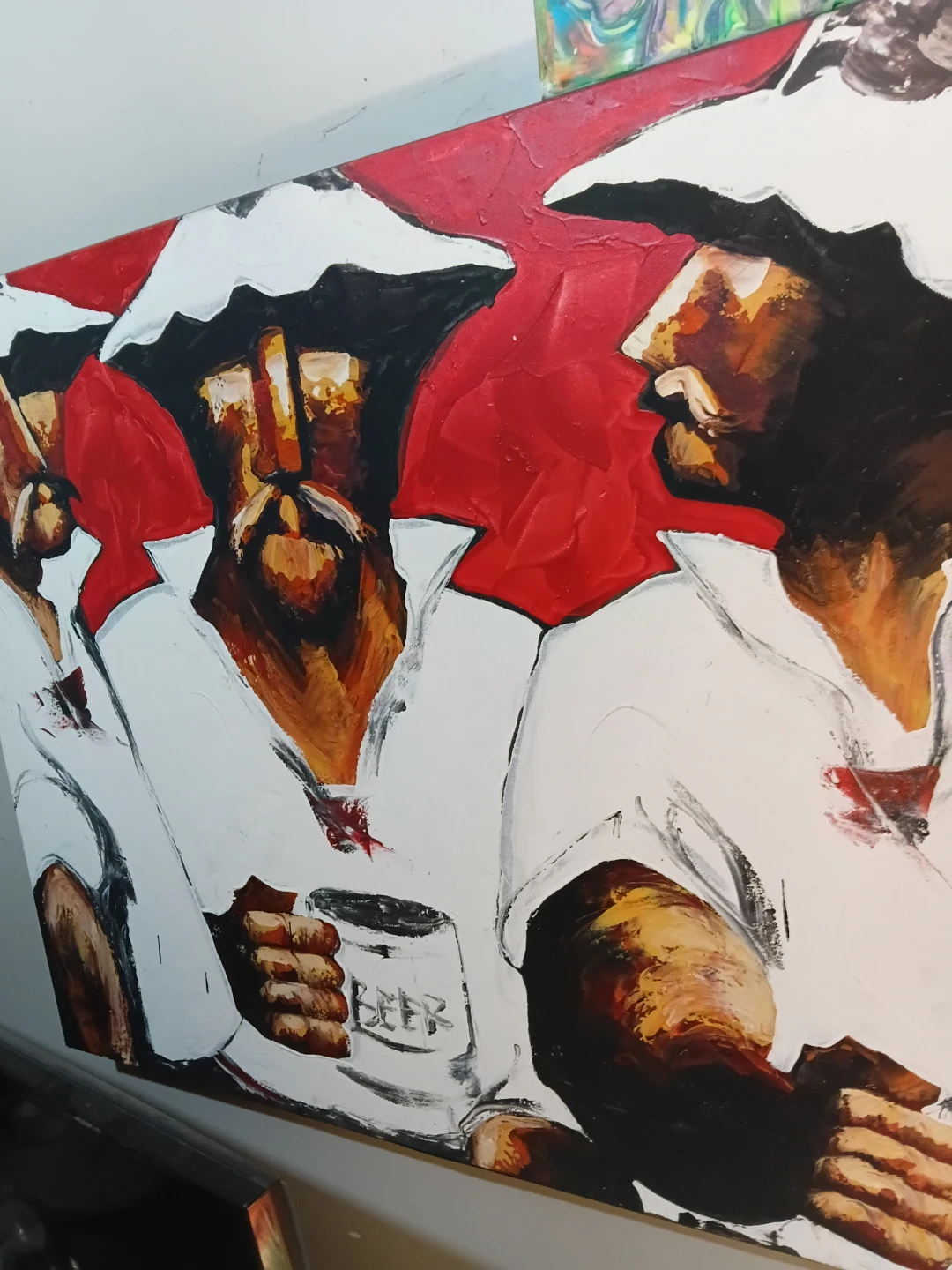Painting of men with beer mugs
