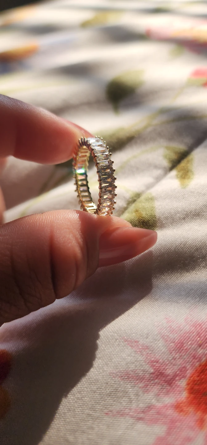 Gold platted eternity band ring with clear baguette stones - photo 3