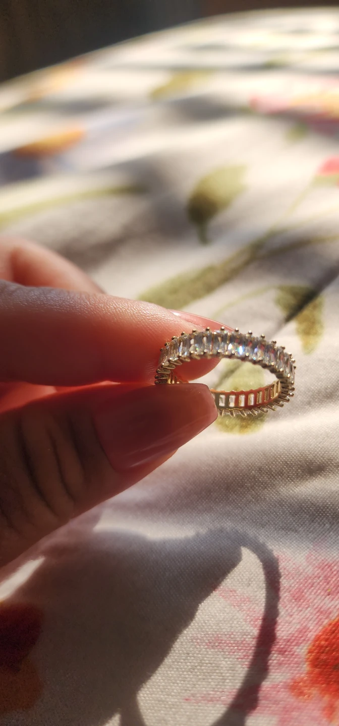 Gold platted eternity band ring with clear baguette stones - photo 5