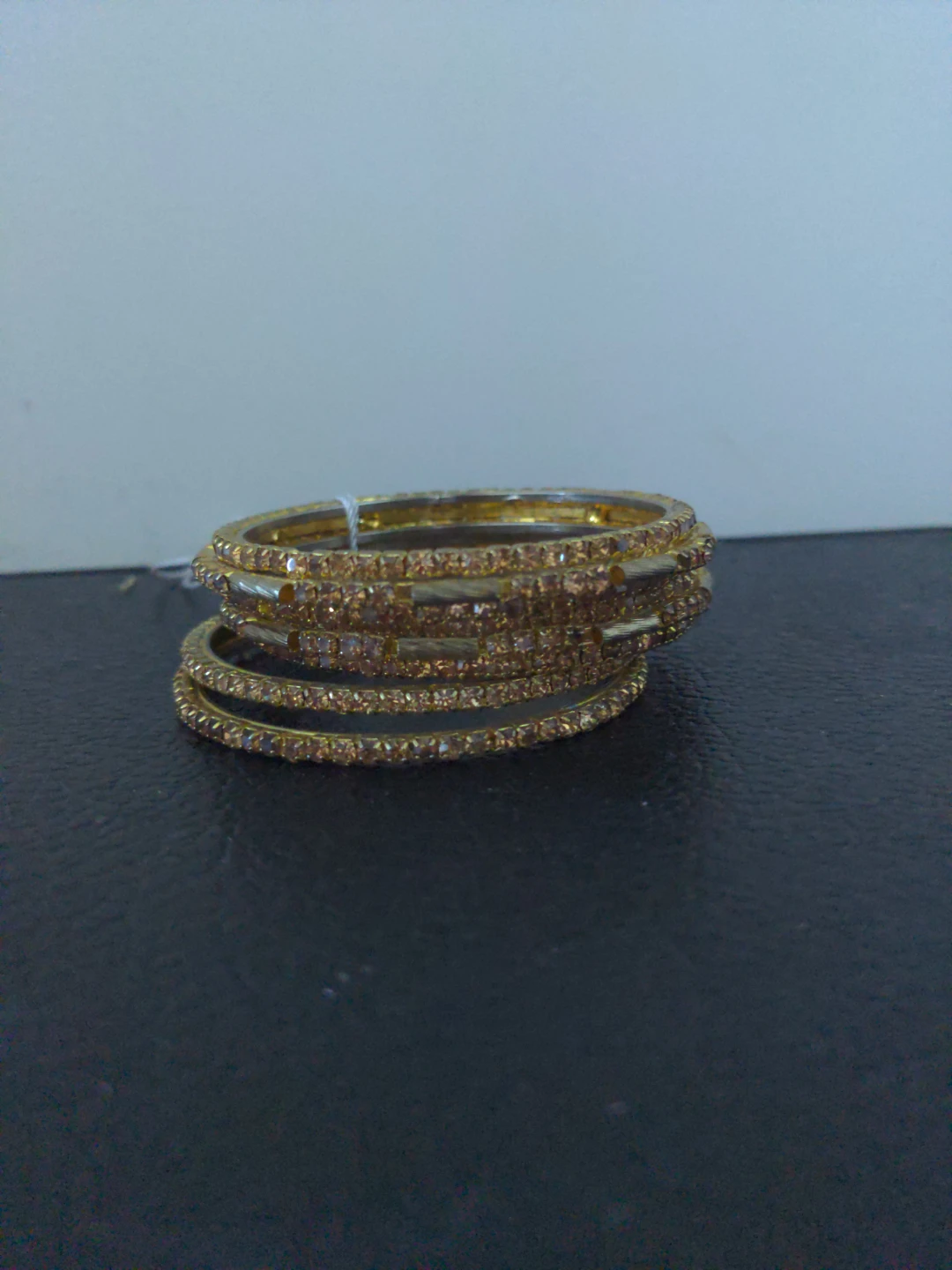 Gold bangles with rhinestones⚽