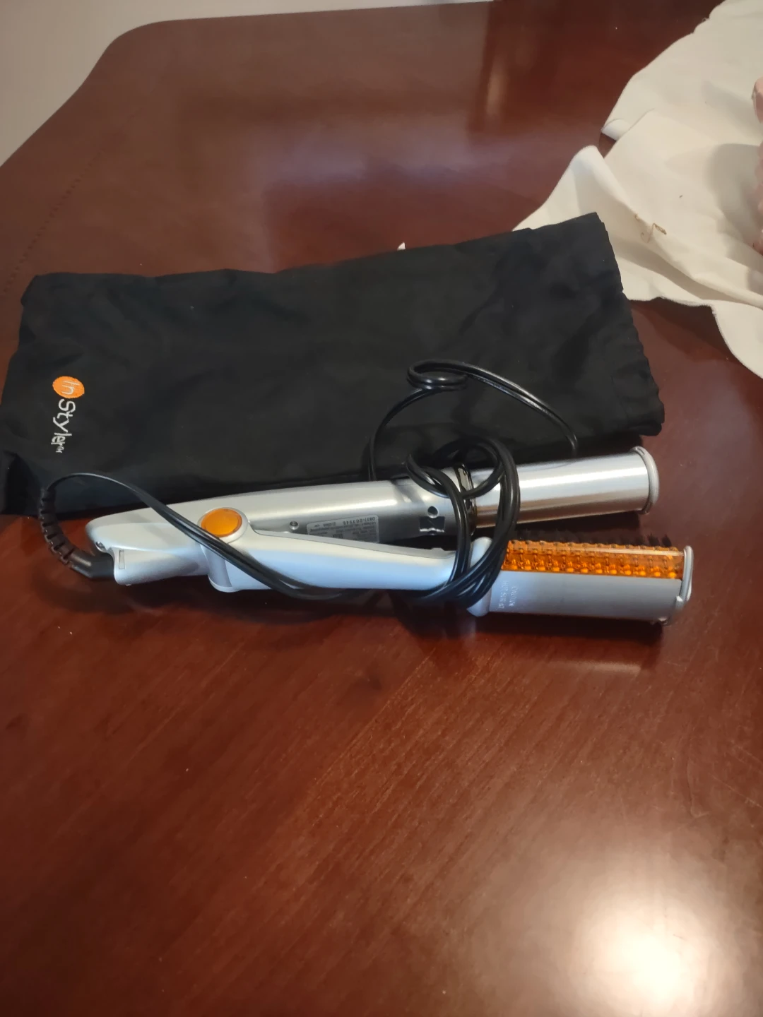 Rotating hair iron