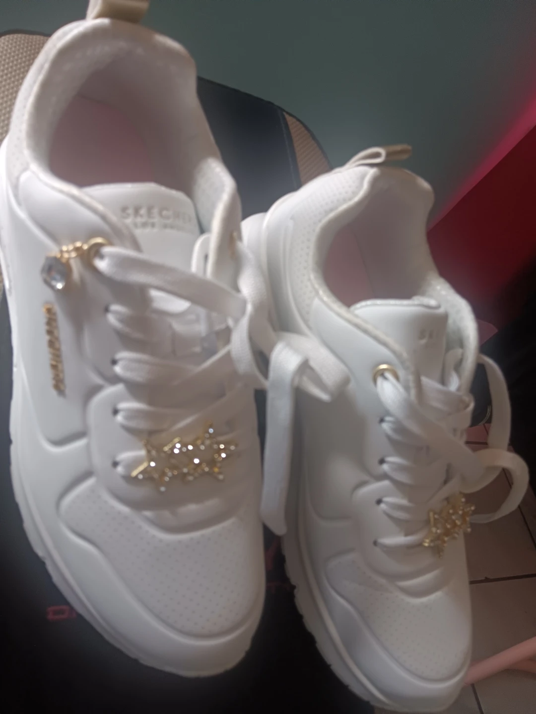 White Skechers Sneakers with Gold Star Charms