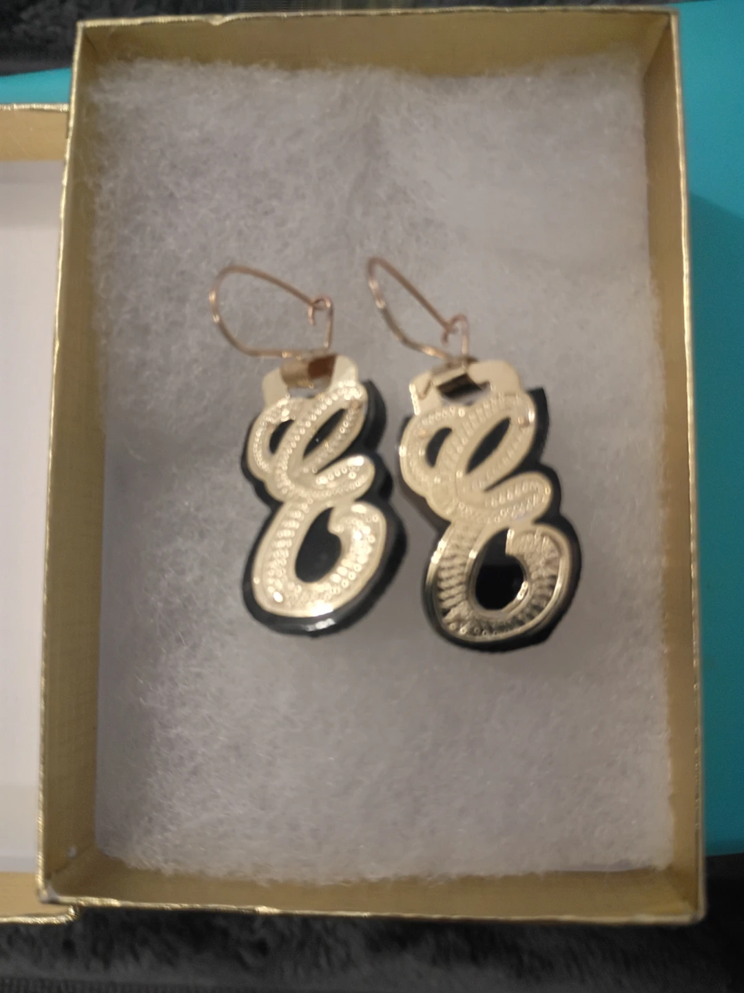 Letter         E.       Real panama gold hanging earrings
