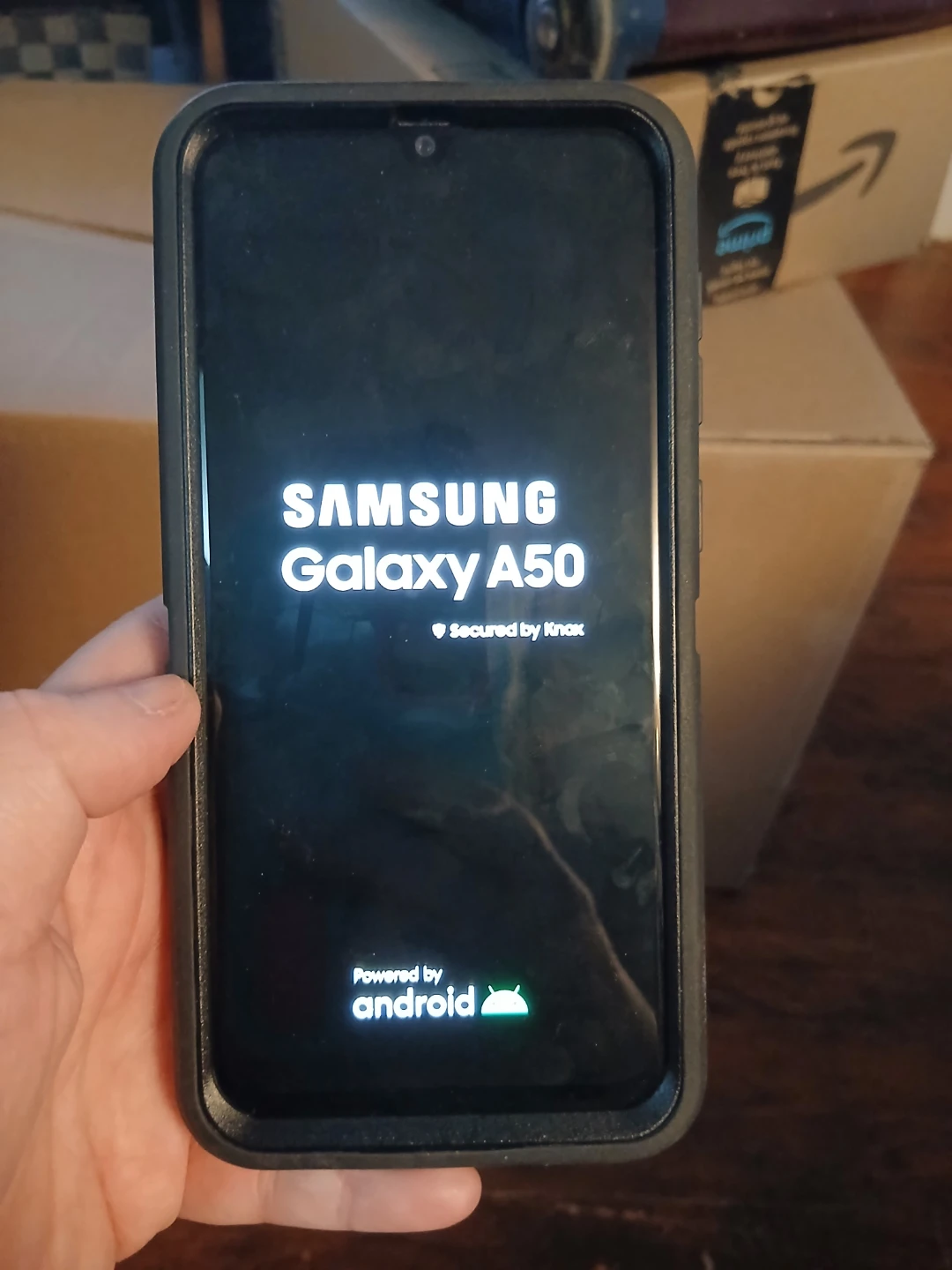 Samsung Galaxy A50 Phone with Otterbox Case and GoCase