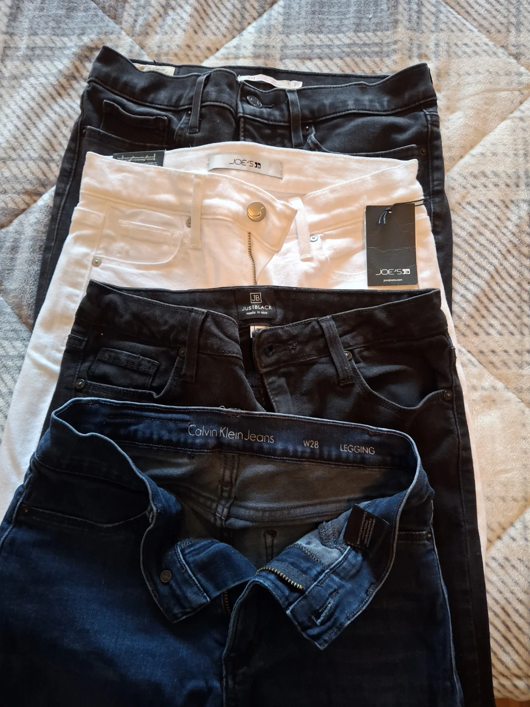 4 pairs of women's jeans: Levi's, Joe's, JB, Calvin Klein