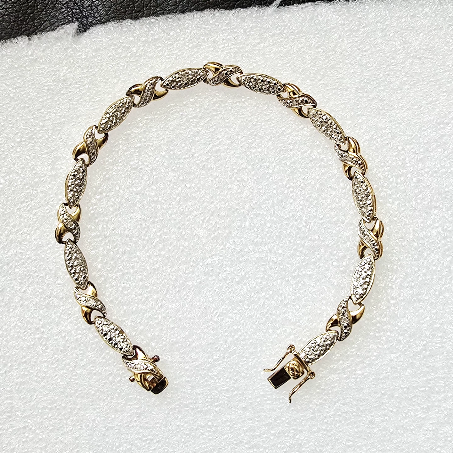 Brand new 925 Silver bracelet small diamond stones in gold tone
