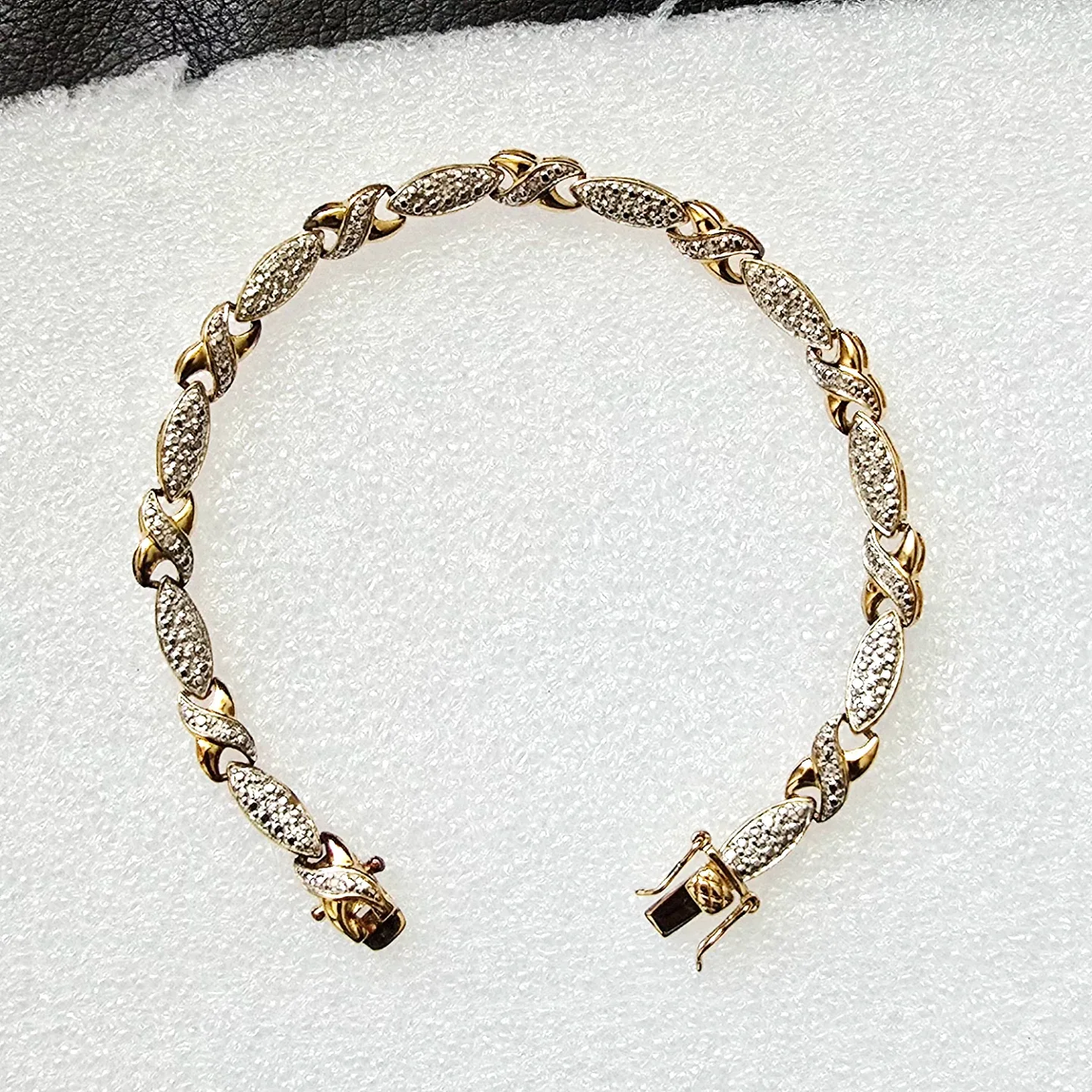 Brand new 925 Silver bracelet small diamond stones in gold tone