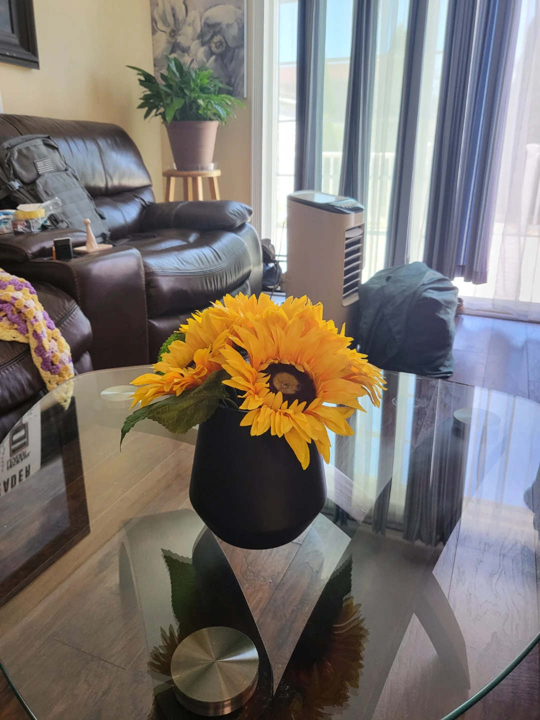 Artificial Sunflowers in Black Vase
