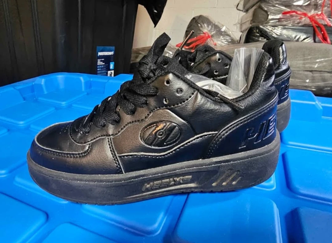 Heelys black roller shoes