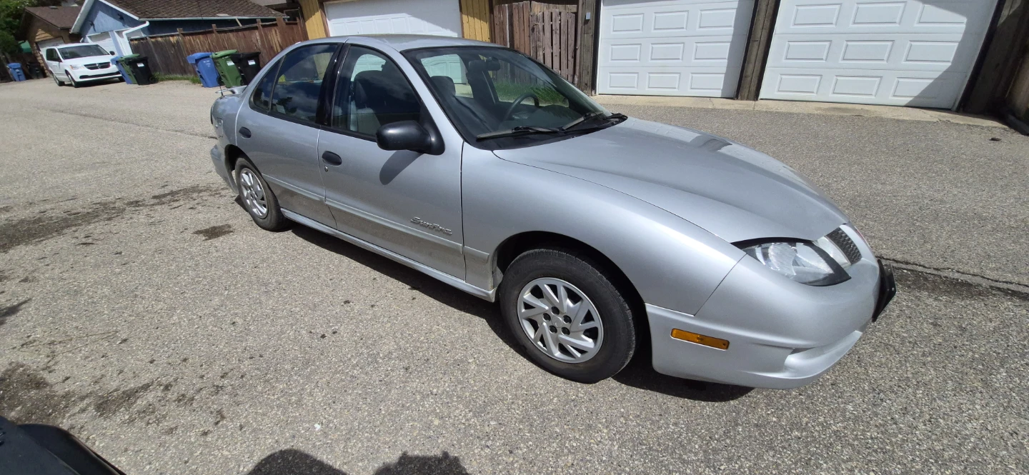 Silver Pontiac Sunfire Sedan - photo 4