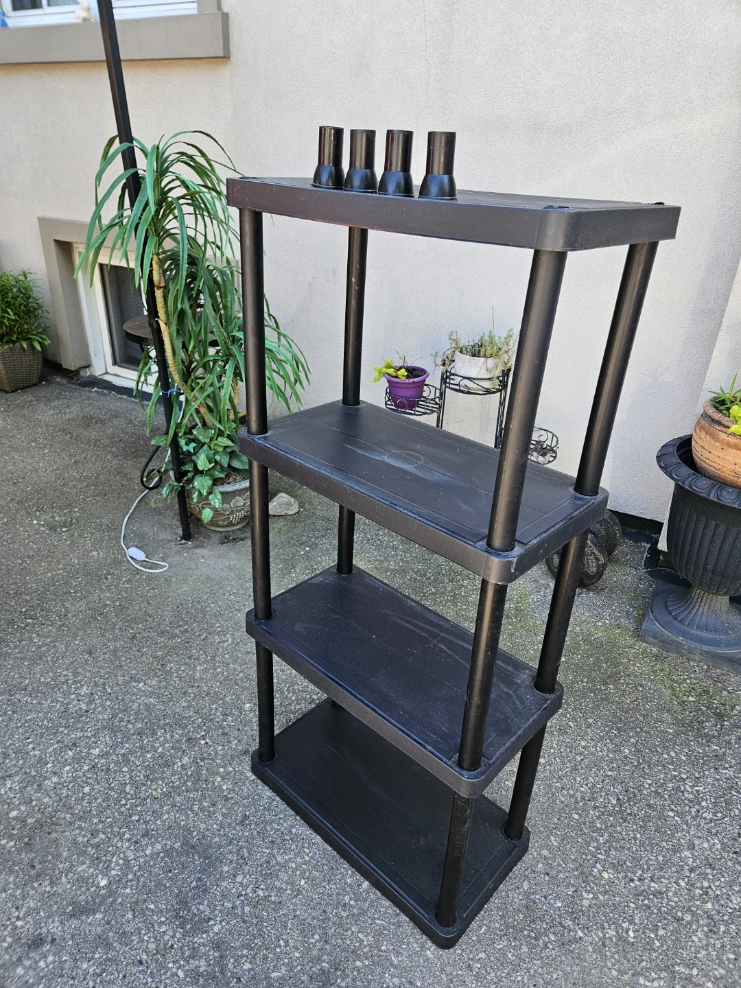 Black 4-Tier Plastic Shelving Unit