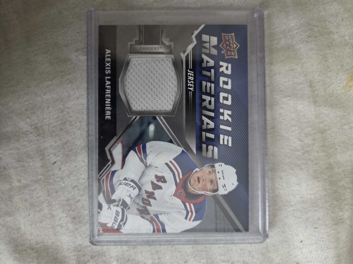 Alexis Lafreniere Rookie Materials Jersey Card