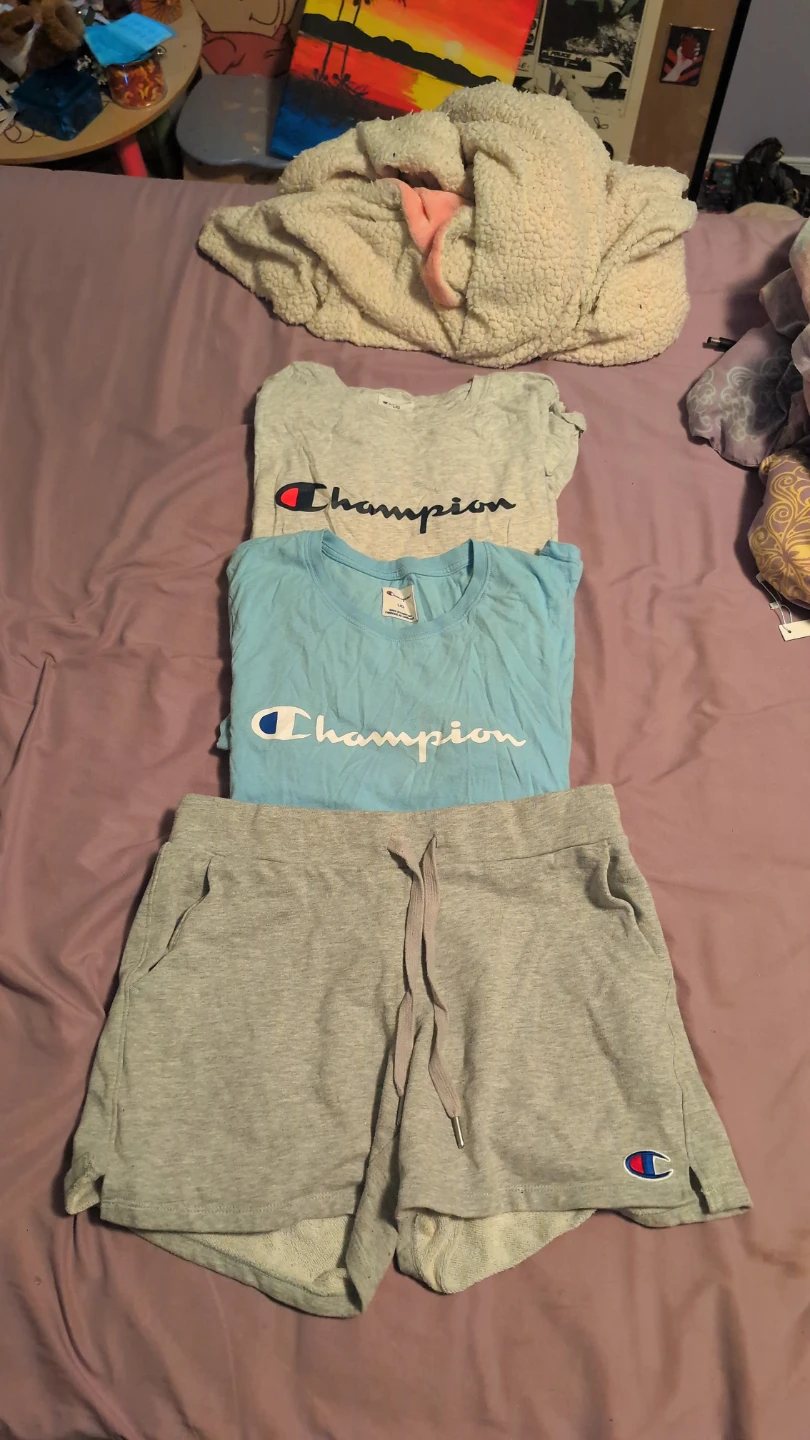 3 Champion Light Blue T-Shirt, + grey T-shirt and shorts.