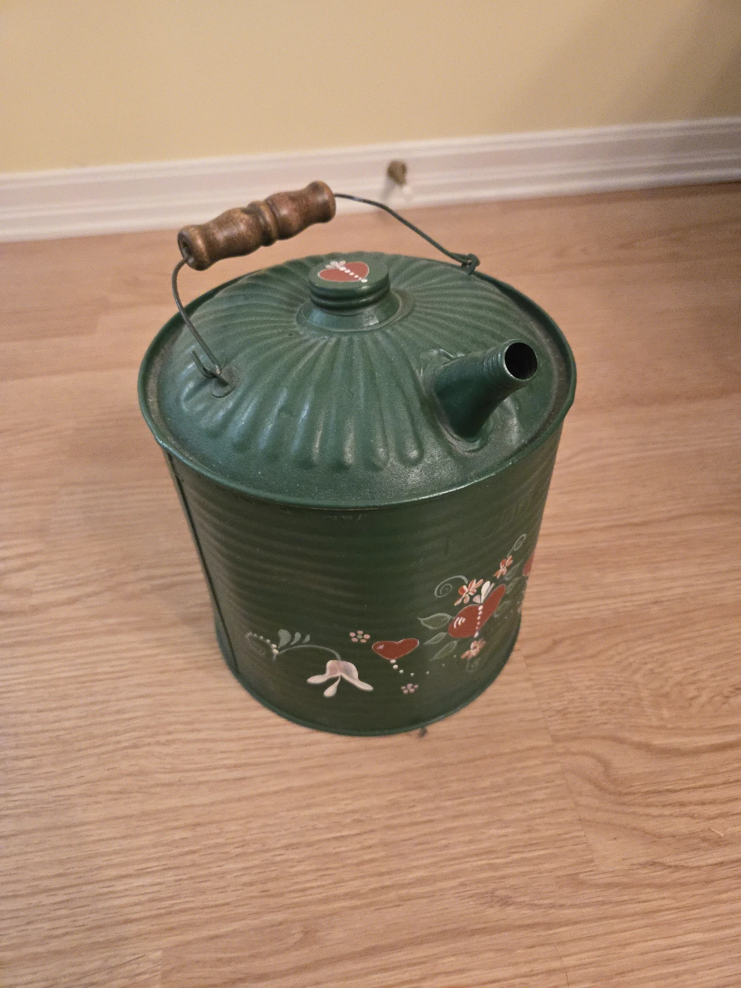 Vintage Green Metal Watering Can with Hearts