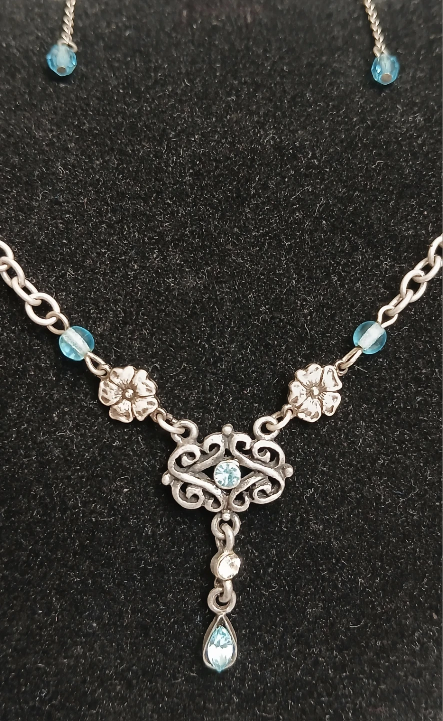 Silver-tone necklace and earring set with blue beads