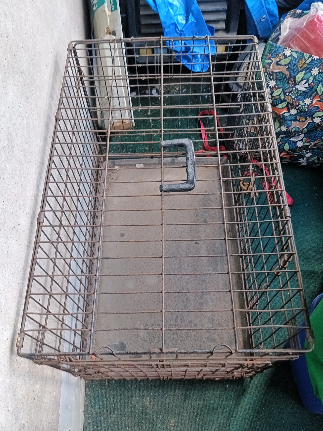 Wire Pet Cage with Handle. Need to me clean.