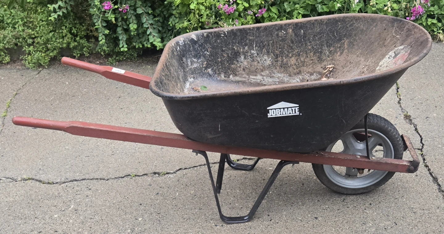 Wheelbarrow with solid, flat-free polyurethane tire. Job Mate