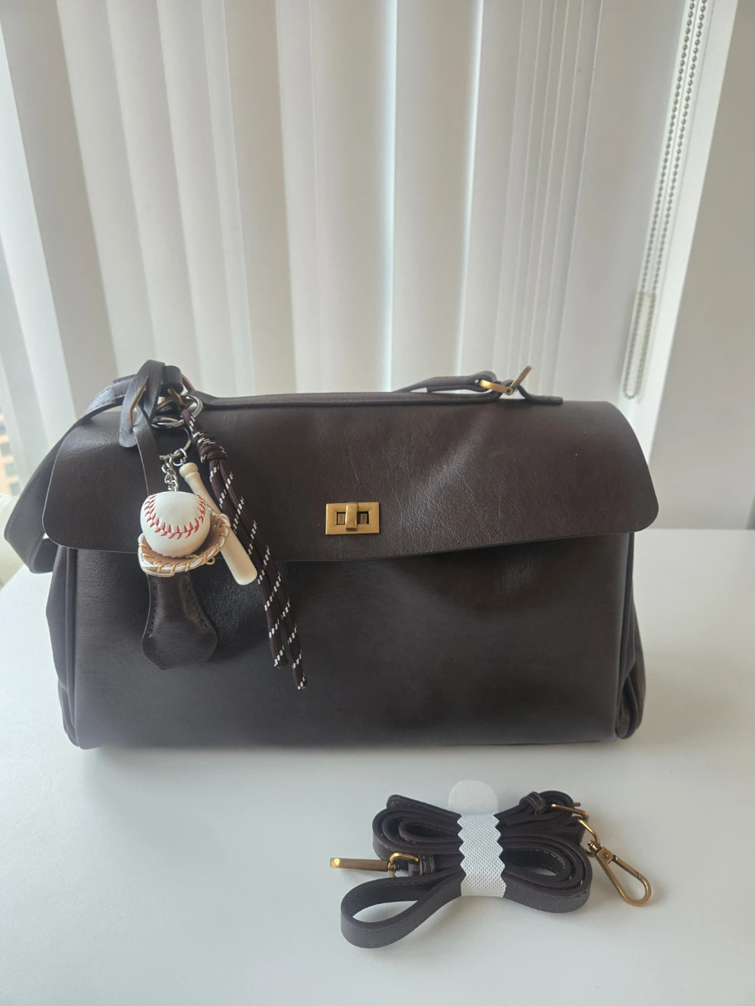 Vovia Brown Leather Handbag with Baseball Charm