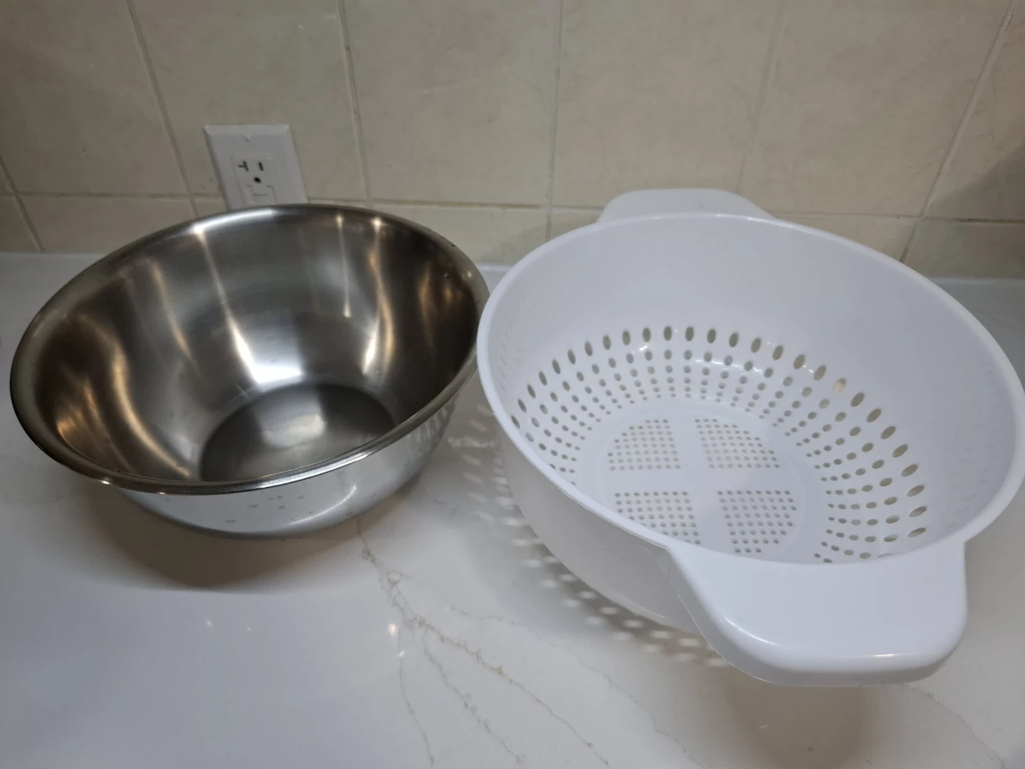 Stainless Steel Mixing Bowl and White Colander
