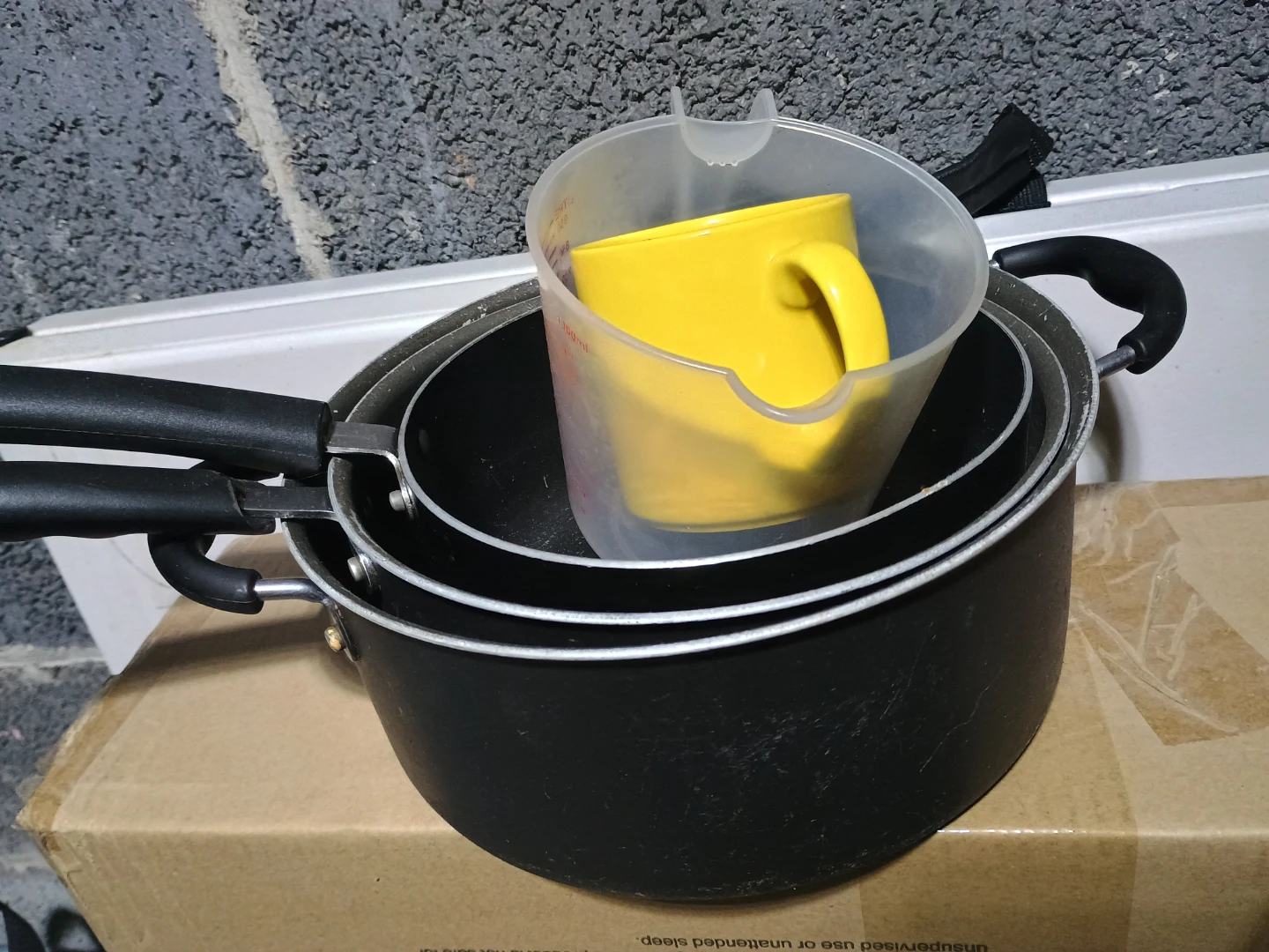 Used Pots, Measuring Cup, and Yellow Mug - photo 2