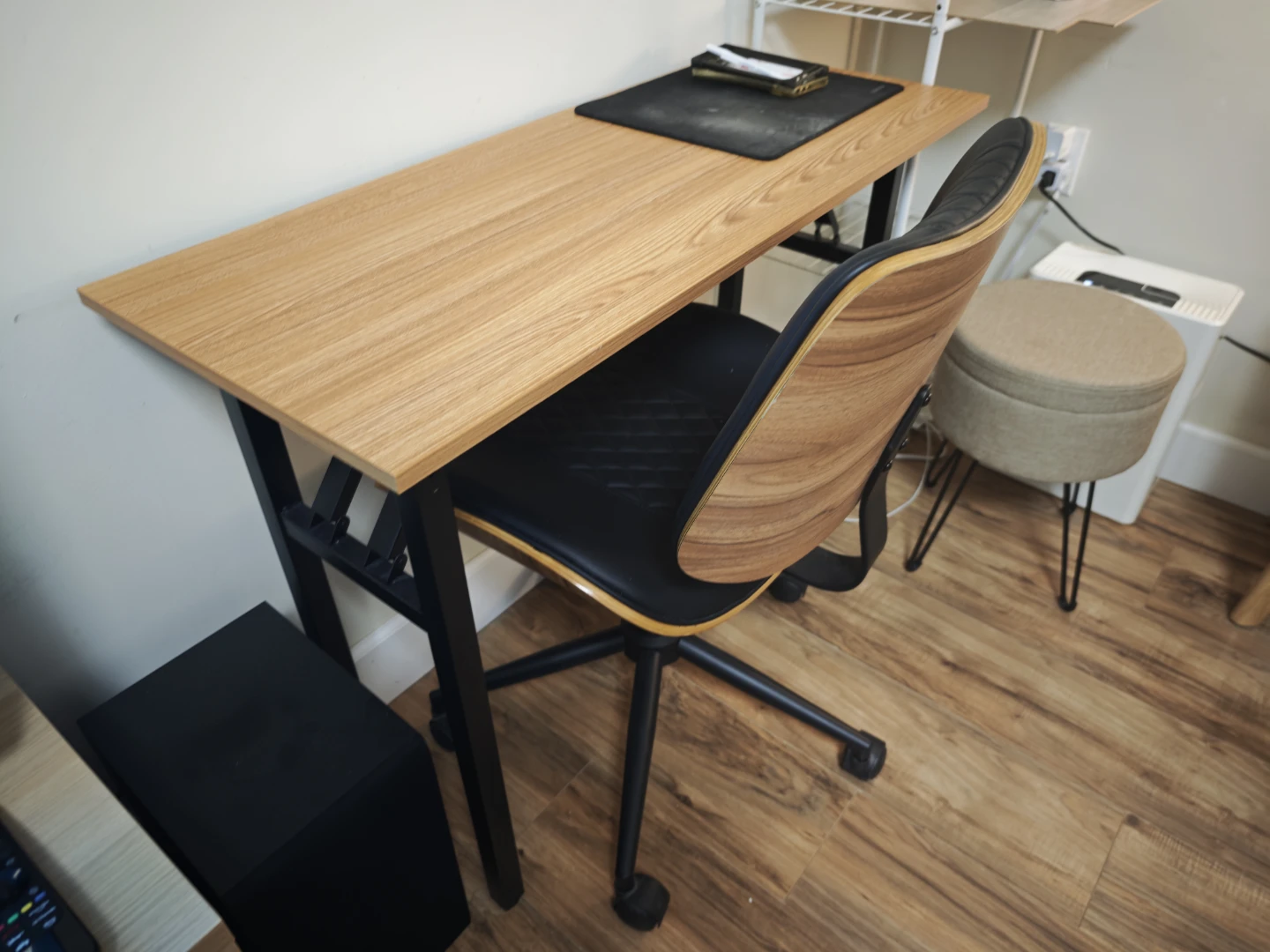 Wood grain desk with black metal frame