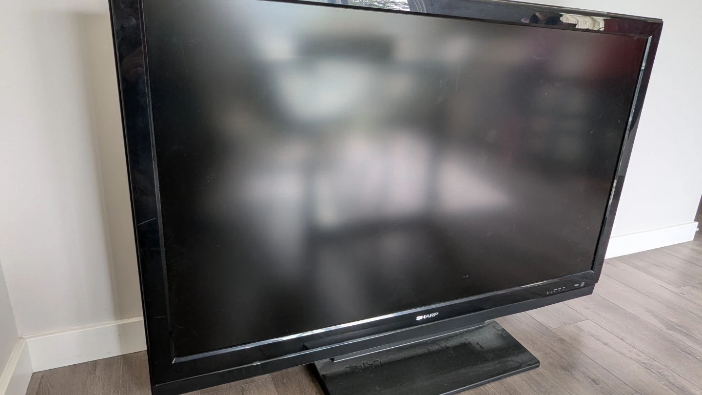FREE: 55” Sharp LCD TV (Needs Repair / For Parts)