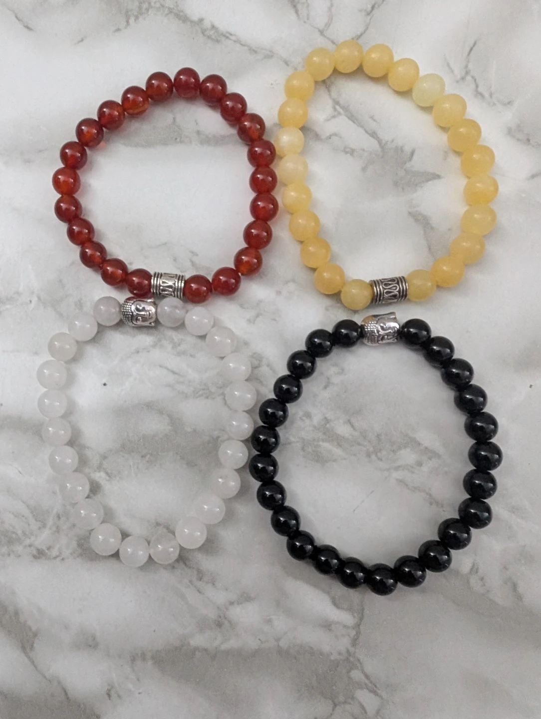 Set of 4 Beaded Bracelets with Charms